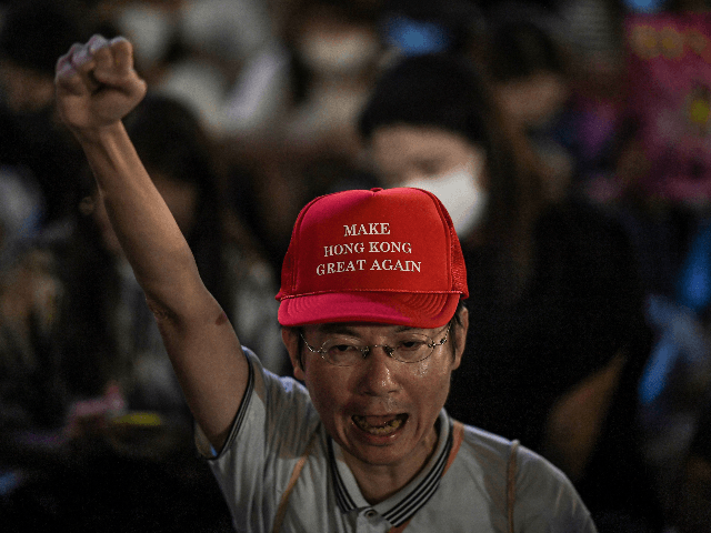 A man shouts slogans during a rally at Edinburgh Place in Hong Kong on September 27, 2019,