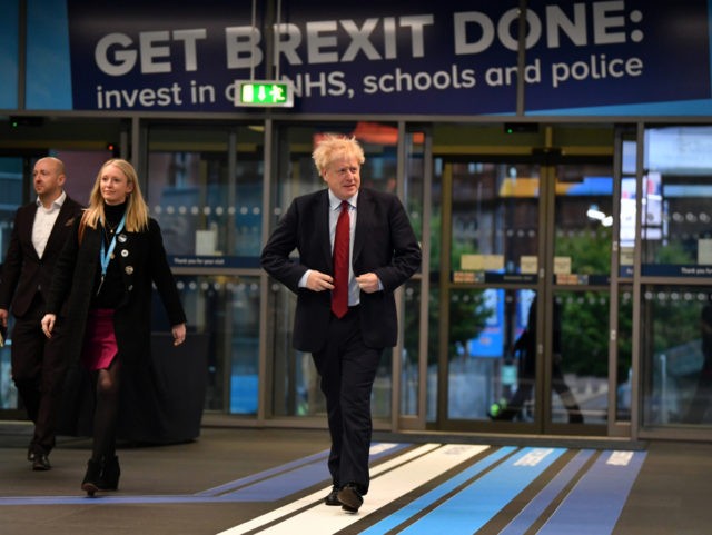 MANCHESTER, ENGLAND - OCTOBER 01: Prime Minister Boris Johnson arrives for the third day of the Conservative Party Conference at Manchester Central on October 1, 2019 in Manchester, England. Despite Parliament voting against a government motion to award a recess, Conservative Party Conference still goes ahead. Parliament will continue with …