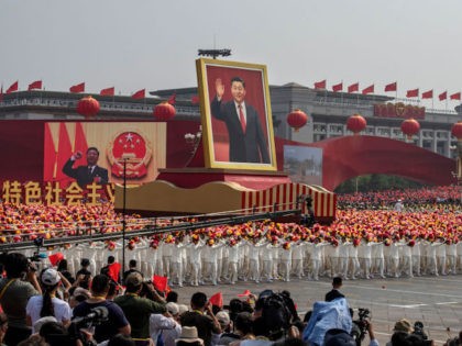 BEIJING, CHINA - OCTOBER 01: A giant portrait of Chinese President Xi Jinping is carried atop a float at a parade to celebrate the 70th Anniversary of the founding of the People's Republic of China in 1949 , at Tiananmen Square on October 1, 2019 in Beijing, China. (Photo by …