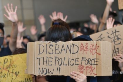 TOPSHOT - Protesters and supporters gather outside the entrance to the West Kowloon Court in Hong Kong on October 2, 2019, where some 96 protesters arrested and charged with rioting during clashes with police on September 29 were to make an appearance in court. - Spontaneous flash-mob rallies broke out …