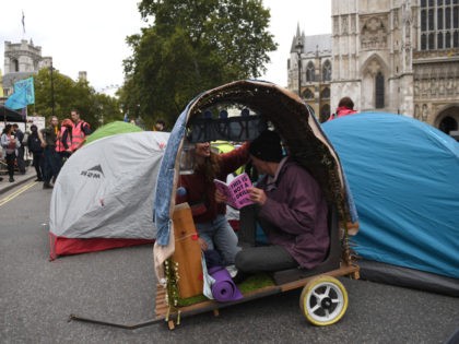 LONDON, ENGLAND - OCTOBER 07: Extinction Rebellion protesters outside Westminster Abbey on