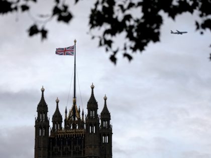 A Union flag flies from a pole atop the Victoria Tower at the Houses of Parliament in London on October 9, 2019. - Brexit talks between Britain and the European Union teetered on the brink of collapse on Tuesday, with tit-for-tat claims of intransigence and sabotage before an end of …