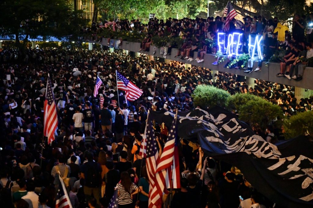 Protesters attend a rally in Hong Kong on October 14, 2019, calling on US politicians to pass a bill that could alter Washington's relationship with the trading hub. - Strife-torn Hong Kong is sliding towards becoming a police state, US senator Josh Hawley warned on October 14, as the financial hub braces for a rally calling on Washington to punish China over sliding freedoms. (Photo by Anthony WALLACE / AFP) (Photo by ANTHONY WALLACE/AFP via Getty Images)