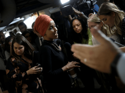 Rep. Ilhan Omar (D-MN) answers questions from reporters after leaving a House Democratic c