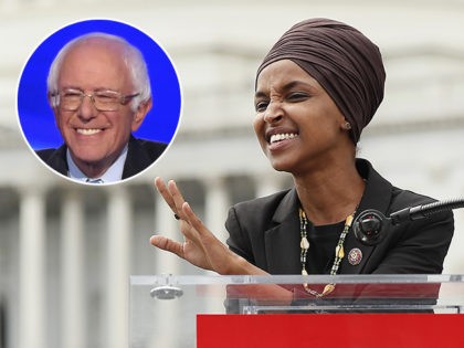 (INSET: Bernie Sanders) WASHINGTON, DC - SEPTEMBER 26: Rep. Ilhan Omar (D-MN) speaks at the “Impeachment Now!” rally in support of an immediate inquiry towards articles of impeachment against U.S. President Donald Trump on the grounds of the U.S. Capital on September 26, 2019in Washington, DC. (Photo by Paul Morigi/Getty …