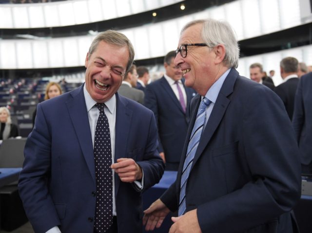 Brexit campaigner and Member of the European Parliament Nigel Farage (L) and European Comm