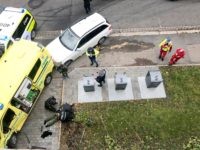 TOPSHOT - A man is arrested by the police after hijacking an ambulanse in Oslo on October 22, 2019 in Oslo, Norway. - Norwegian police arrested an armed man who, according to media reports, went on the rampage in Oslo inthe stolen ambulance, running down pedestrians including a baby in …