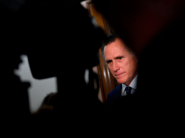 US Senator Mitt Romney (R-UT) speaks with reporters after a hearing on Capitol Hill in Washington, DC on October 22, 2019. (Photo by Andrew CABALLERO-REYNOLDS / AFP) (Photo by ANDREW CABALLERO-REYNOLDS/AFP via Getty Images)