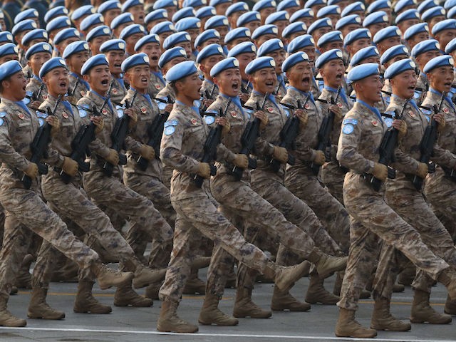 BEIJING, CHINA - OCTOBER 01: Soldiers of the People's Liberation Army march during a parade to celebrate the 70th Anniversary of the founding of the People's Republic of China in 1949, at Tiananmen Square on October 1, 2019 in Beijing, China. (Photo by Andrea Verdelli/Getty Images)