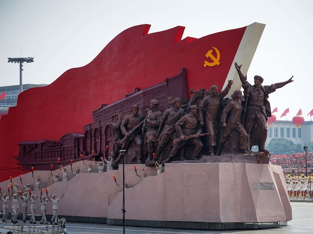 BEIJING, CHINA - OCTOBER 01: A float featuring the hammer and sickle is seen during a parade to celebrate the 70th Anniversary of the founding of the People's Republic of China in 1949, at Tiananmen Square on October 1, 2019 in Beijing, China. (Photo by Andrea Verdelli/Getty Images)