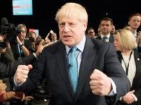 MANCHESTER, ENGLAND - OCTOBER 02: Chancellor of the Exchequer Sajid Javid congratulates Prime Minister Boris Johnson following his keynote speech on day four of the 2019 Conservative Party Conference at Manchester Central on October 2, 2019 in Manchester, England. The U.K. government prepares to formally submit its finalised Brexit plan …