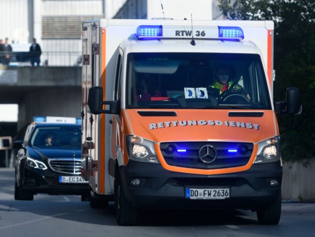 An ambulance car carrying German Economy Minister Peter Altmaier leaves the venue towards