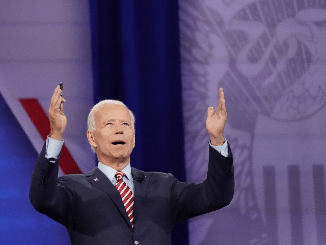Democratic U.S. presidential candidate and former Vice President Joe Biden gestures to the crowd at the Human Rights Campaign Foundation and CNN’s presidential town hall, focused on LGBTQ issues, on October 10, 2019 in Los Angeles, California. It is the first Presidential event broadcast on a major news network focused …