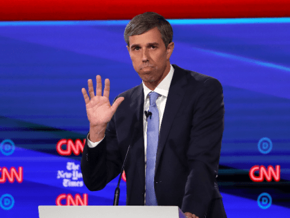 Former Texas congressman Beto O'Rourke reacts on stage during the Democratic Presidential