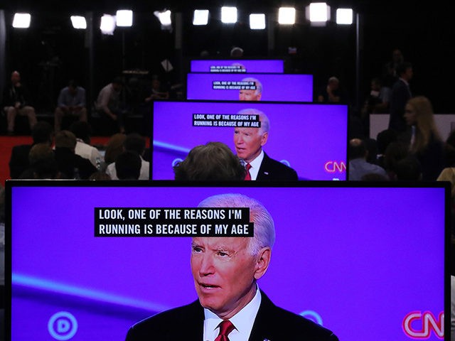 WESTERVILLE, OHIO - OCTOBER 15: Former Vice President Joe Biden appears on television screens in the Media Center during the Democratic Presidential Debate at Otterbein University on October 15, 2019 in Westerville, Ohio. A record 12 presidential hopefuls are participating in the debate hosted by CNN and The New York …