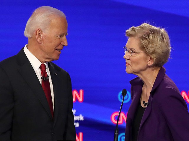 WESTERVILLE, OHIO - OCTOBER 15: Former Vice President Joe Biden and Sen. Elizabeth Warren (D-MA) react during a break at the Democratic Presidential Debate at Otterbein University on October 15, 2019 in Westerville, Ohio. A record 12 presidential hopefuls are participating in the debate hosted by CNN and The New …