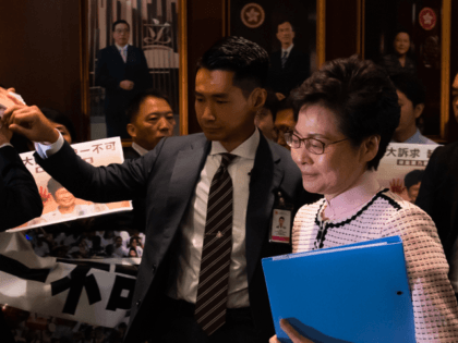 Hong Kong's Chief Executive Carrie Lam walks into the chamber to give her annual policy ad