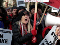 Chicago public school teachers and their supporters picket outside of Lane Tech College Prep high school on October 17, 2019 in Chicago, Illinois. About 25,000 Chicago school teachers went on strike today after the Chicago Teachers Union (CTU) failed to reach a contract agreement with the city. Chicago has the …
