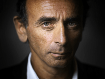 French journalist and writer Eric Zemmour poses at his office in Paris on January 12, 2015. The polemicist and tv commentator's last book entitled "Le Suicide Français" (The French suicide), which was released in October 2014, is a best-seller. In an interview given to Italian newspaper Corriere della Sera in …