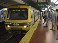 Commuterswait for a subway car in Buenos Aires, on March 31, 2016. Layoffs in the public sector and up to 100% fare increases in public transport, combined with increases in other commodities and food services, multiplied protests in Argentina, while trade unionists warn of the end of the "honeymoon" with …