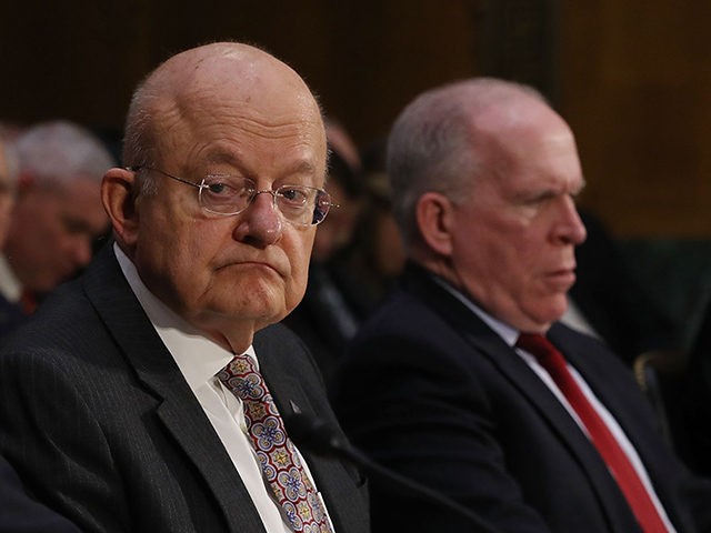 WASHINGTON, DC - JANUARY 10: FBI Director James Comey, Director of National Intelligence James Clapper and Central Intelligence Agency Director John Brennan (L-R) testify before the Senate (Select) Intelligence Committee in the Dirksen Senate Office Building on Capitol Hill January 10, 2017 in Washington, DC. The intelligence heads testified to …