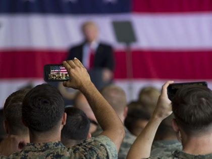 SIGONELLA, ITALY - MAY 27: In this handout provided by U.S. Navy, A Marine records President Donald J. Trump remarks during an all-hands call with service members and their families at Naval Air Station Sigonella May 27, 2017 in Sigonella, Italy. This visit marks President Trump's last stop of his …