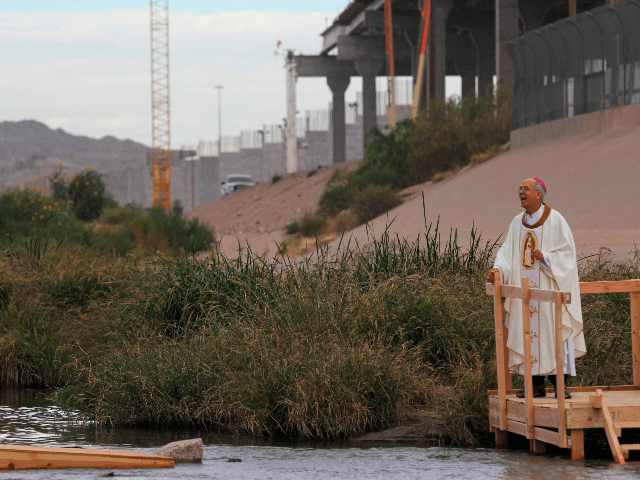 The Catholic bishop of El Paso, Texas, Mark Seitz, participates in a binational mass attended by hundreds of Mexican and US Catholics across the border, held in memory of migrants killed by crossing the Rio Bravo in their attempt to reach the United States in Ciudad Juarez, Chihuahua state, Mexico on November 4, 2017. / AFP PHOTO / HÉRIKA MARTÍNEZ (Photo credit should read HERIKA MARTINEZ/AFP/Getty Images)