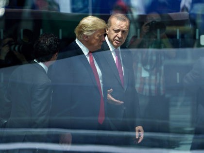 TOPSHOT - US President Donald Trump (L) and Turkey's President Recep Tayyip Erdogan (R) sp