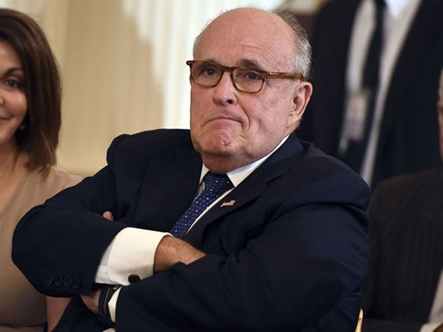 (FILES) In this file photo Lawyer of the US president Rudy Giuliani looks on before the US president announces his Supreme Court nominee in the East Room of the White House on July 9, 2018 in Washington, DC. - Apparent admissions by Donald Trump's lawyer that the president negotiated a …