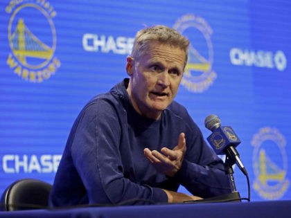 Golden State Warriors coach Steve Kerr gestures while speaking to reporters before the tea