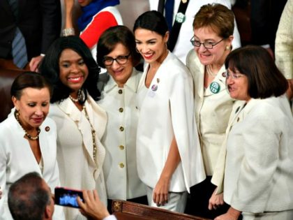 New York Representative (D) Alexandria Octavio-Cortez (center) poses for a picture with other women ahead of President Donald Trump’s State of the Union address at the U.S. Capitol in Washington, D.C., on Feb 5, 2019. (Credit: MANDEL NGAN/AFP/Getty Images)