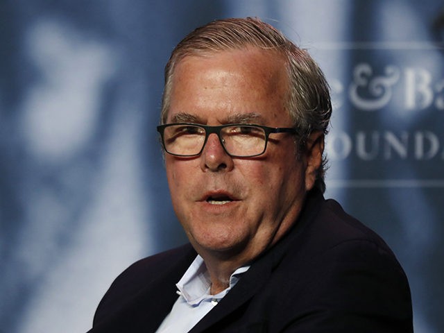 Former Florida Gov. Jeb Bush takes part in a discussion at a George and Barbara Bush Distinguished Lecture, Friday, Sept. 27, 2019, at the University of New England in Biddeford, Maine. (AP Photo/Robert F. Bukaty)