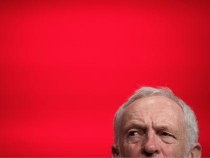 LIVERPOOL, ENGLAND - SEPTEMBER 23: Leader of the Labour Party Jeremy Corbyn listens to spe