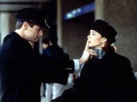 Jim Carrey silencing Lauren Holly in Dumb & Dumber