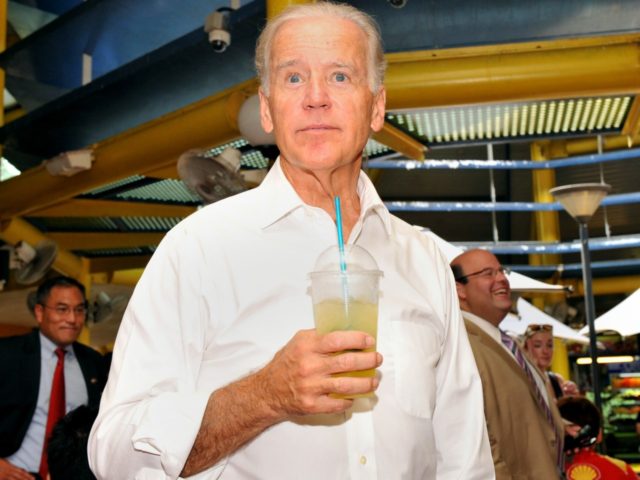 US Vice President Joe Biden enjoys a lime juice during a visit to a food court in Singapor