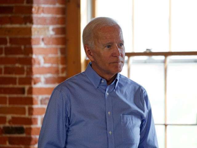 Democratic presidential candidate former Vice President Joe Biden listens to a question du