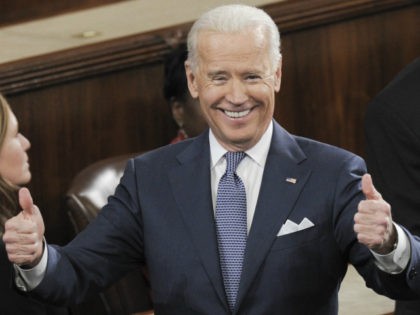 US Vice President Joe Biden gives two thumbs-up prior to US President Barack Obama delivering the State of the Union address before a joint session of Congress on January 28, 2014 at the US Capitol in Washington. AFP PHOTO/Saul LOEB (Photo credit should read SAUL LOEB/AFP/Getty Images)