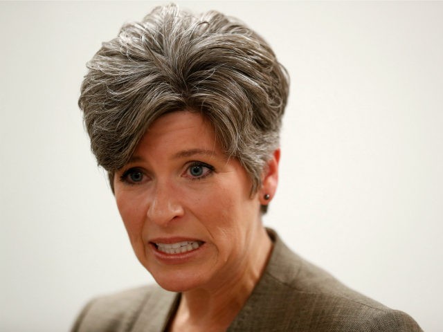 In this Sept. 21, 2017, file photo, Sen. Joni Ernst, R-Iowa, speaks to reporters following