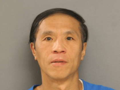 Ke Hu is charged with smearing feces on cars in Bridgeport. (Credit: Chicago Police)
