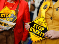 Liberal Democrats party activists hold "Stop Brexit" leaflets as they canvas for support for their party's candidates in the forthcoming European elections, in London on May 22, 2019. (Photo by Tolga Akmen / AFP) (Photo credit should read TOLGA AKMEN/AFP/Getty Images)