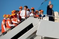US President Donald Trump boards Air Force One with members of the Little League World Championship baseball team, the Eastbank All Stars of Louisiana, prior to departure from Joint Base Andrews in Maryland, October 11, 2019, as he travels to Louisiana, to hold a campaign rally. (Photo by SAUL LOEB …