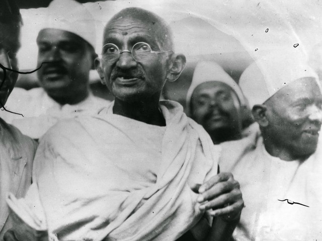 Mahatma Gandhi (Mohandas Karamchand Gandhi,1869 - 1948), Indian nationalist and spiritual leader, leading the Salt March in protest against the government monopoly on salt production. (Photo by Central Press/Getty Images)