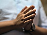 Man Hands in Prayer AFP