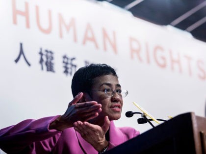Maria Ressa, co-founder and CEO of the Philippines-based news website Rappler, speaks at the Human Rights Press Awards at the Foreign Correspondents Club of Hong Kong on May 16, 2019. - Currently free on bail after her second arrest this year, Ressa spoke on the dangers she and her colleagues …