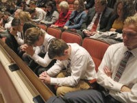 People pray during The Church of Jesus Christ of Latter-day Saints' twice-annual church conference Saturday, Oct. 5, 2019, in Salt Lake City. President Russell M. Nelson has rolled out a dizzying number of policy changes during his first two years at the helm of the faith, leading to heightened anticipation …