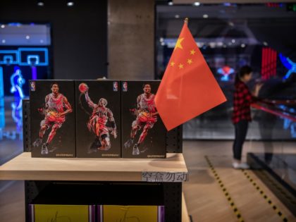 BEIJING, CHINA - OCTOBER 09: A Chinese flag is seen placed on merchandise in the NBA flags