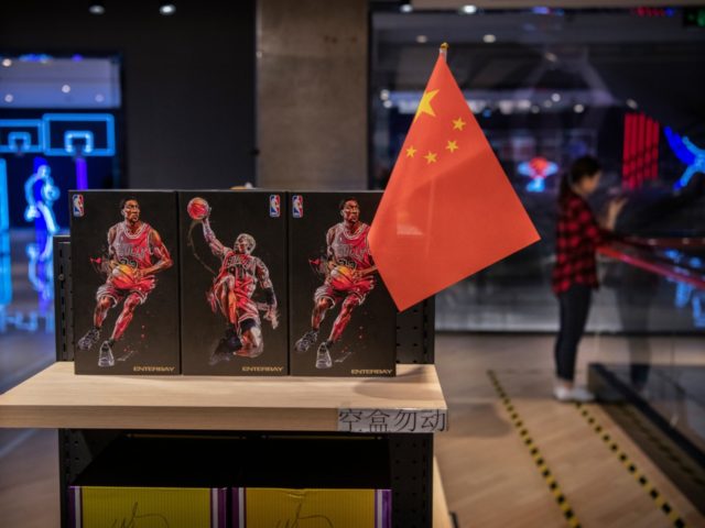 BEIJING, CHINA - OCTOBER 09: A Chinese flag is seen placed on merchandise in the NBA flags