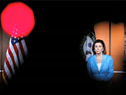 WASHINGTON, DC - OCTOBER 02: House Speaker Nancy Pelosi (D-CA) looks on during a weekly ne