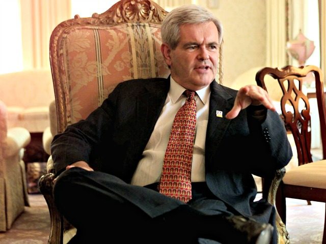 House Speaker Newt Gingrich of Ga. talks with three Associated Press reporters at a Washin