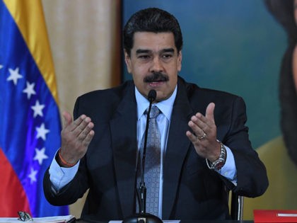 Venezuelan President Nicolas Maduro speaks during a press conference in Caracas on September 30, 2019. - Virtually all countries sent diplomats to the United Nations for the General Assembly last week, but Venezuela was a special case -- it had two delegations, each dueling for recognition. (Photo by YURI CORTEZ …